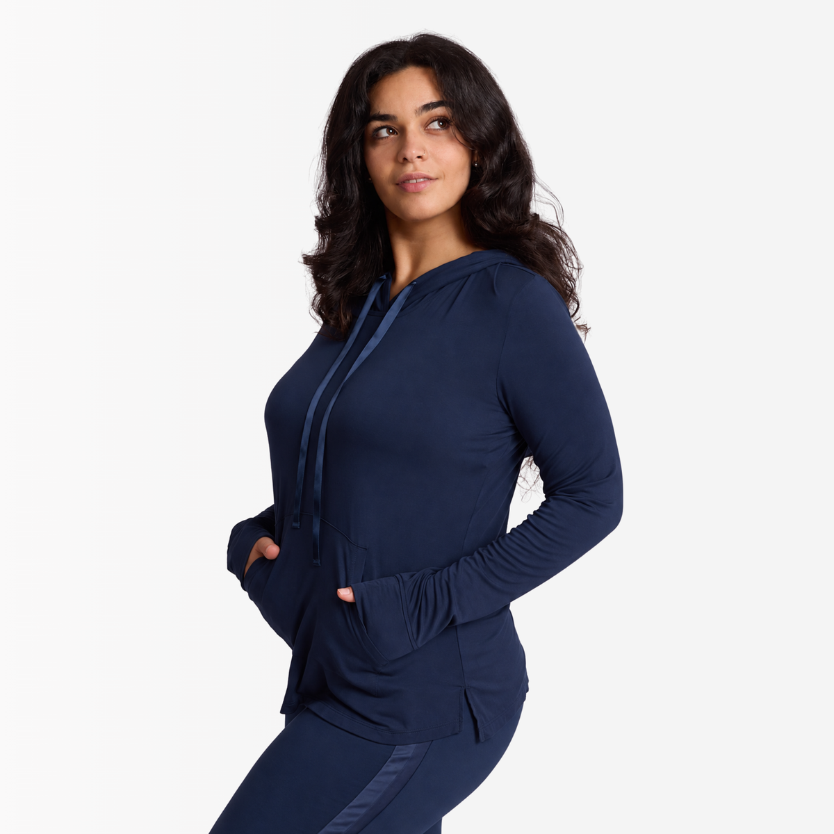 Woman wearing Night Sky (blue) bamboo Hoodie with satin stripe on oversized hood and satin drawstrings