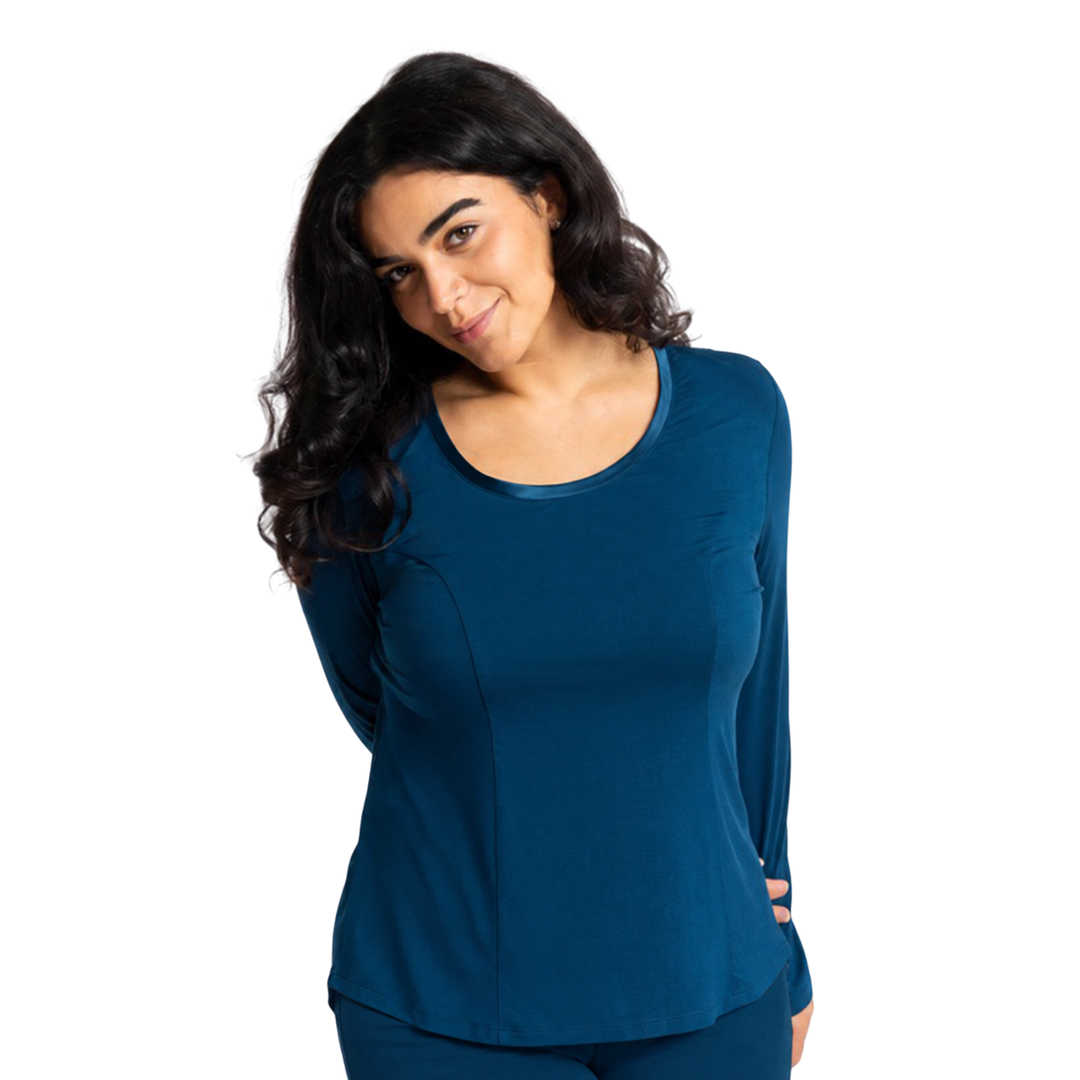 A woman modeling a long-sleeve scoop-neck Princess Seamed top with a satin trim neckline in Evening Tide photographed against a clean white studio background.