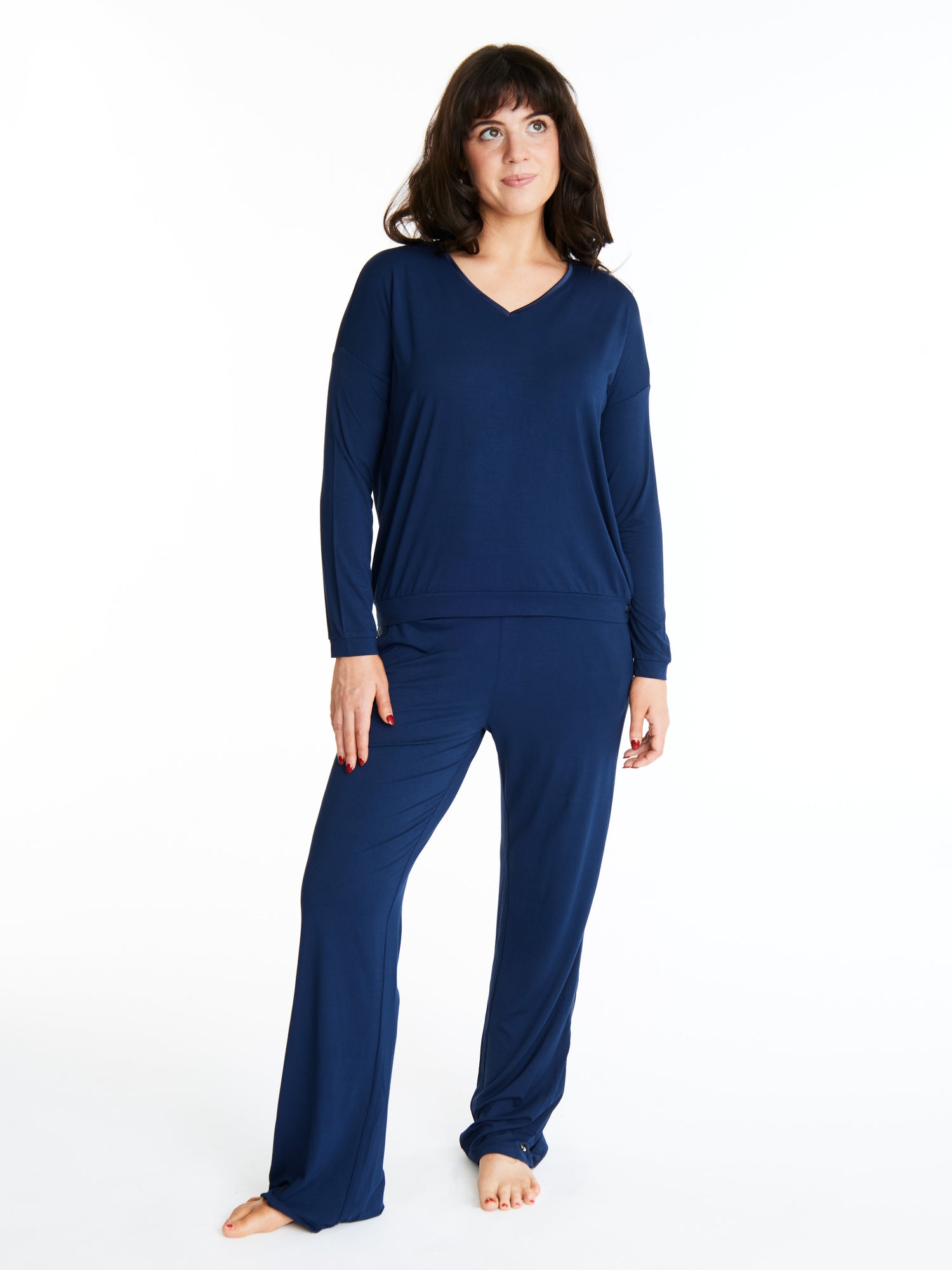 Woman in Midnighties tuxedo set in color Night Sky