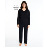 Woman in Midnighties Tuxedo-striped lounge set in color Midnight