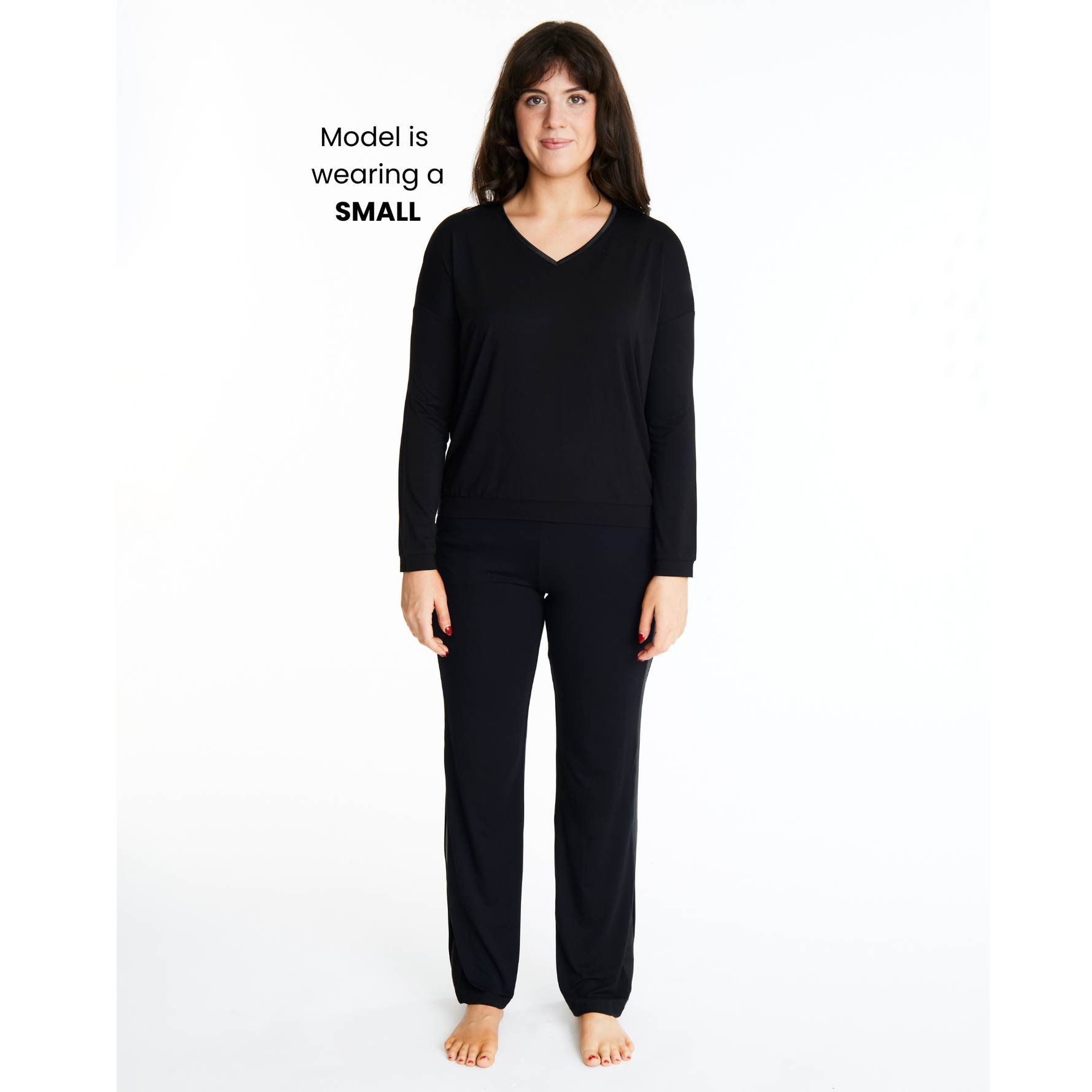 Woman in Midnighties Tuxedo-striped lounge set in color Midnight