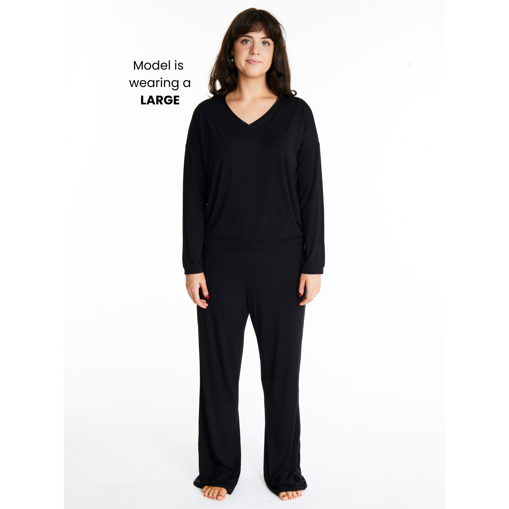 Woman in Midnighties Tuxedo-striped lounge set in color Midnight