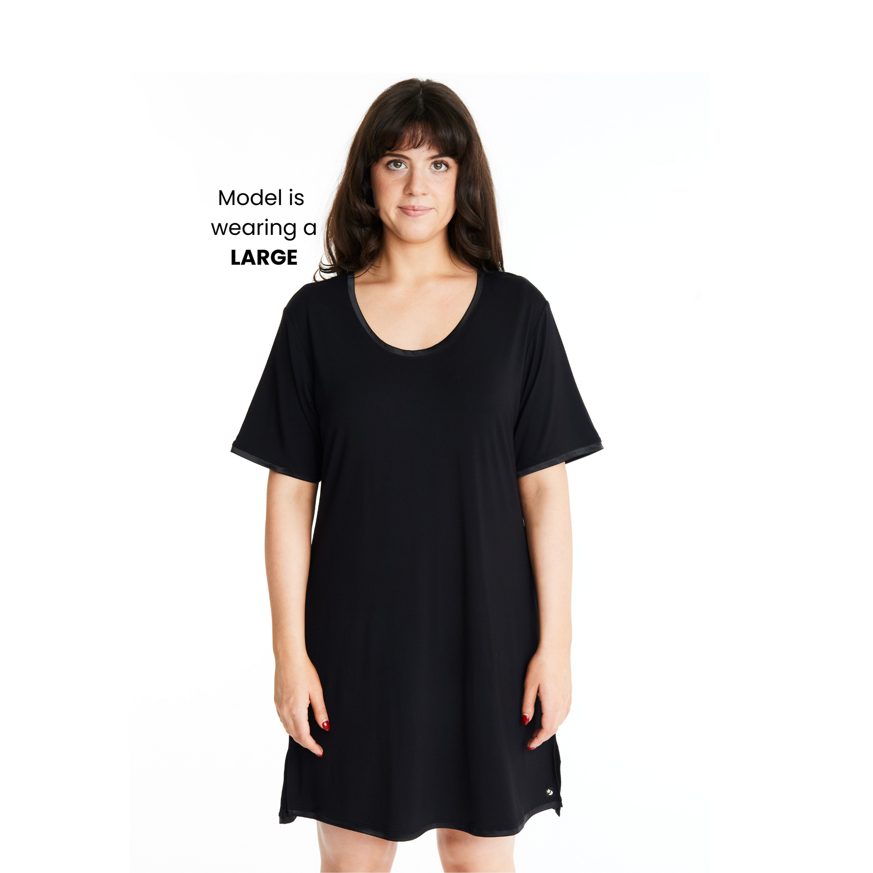 A woman wearing a short-sleeved, scoop-neck, knee-length nightie in a solid color, with satin trim detailing.