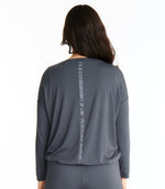 Woman in Midnighties long sleeve Tuxedo-striped top in color Moonshadow