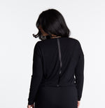 Woman in Midnighties long sleeve Tuxedo-striped top in color Midnight