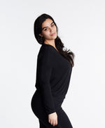 Woman in Midnighties long sleeve Tuxedo-striped top in color Midnight