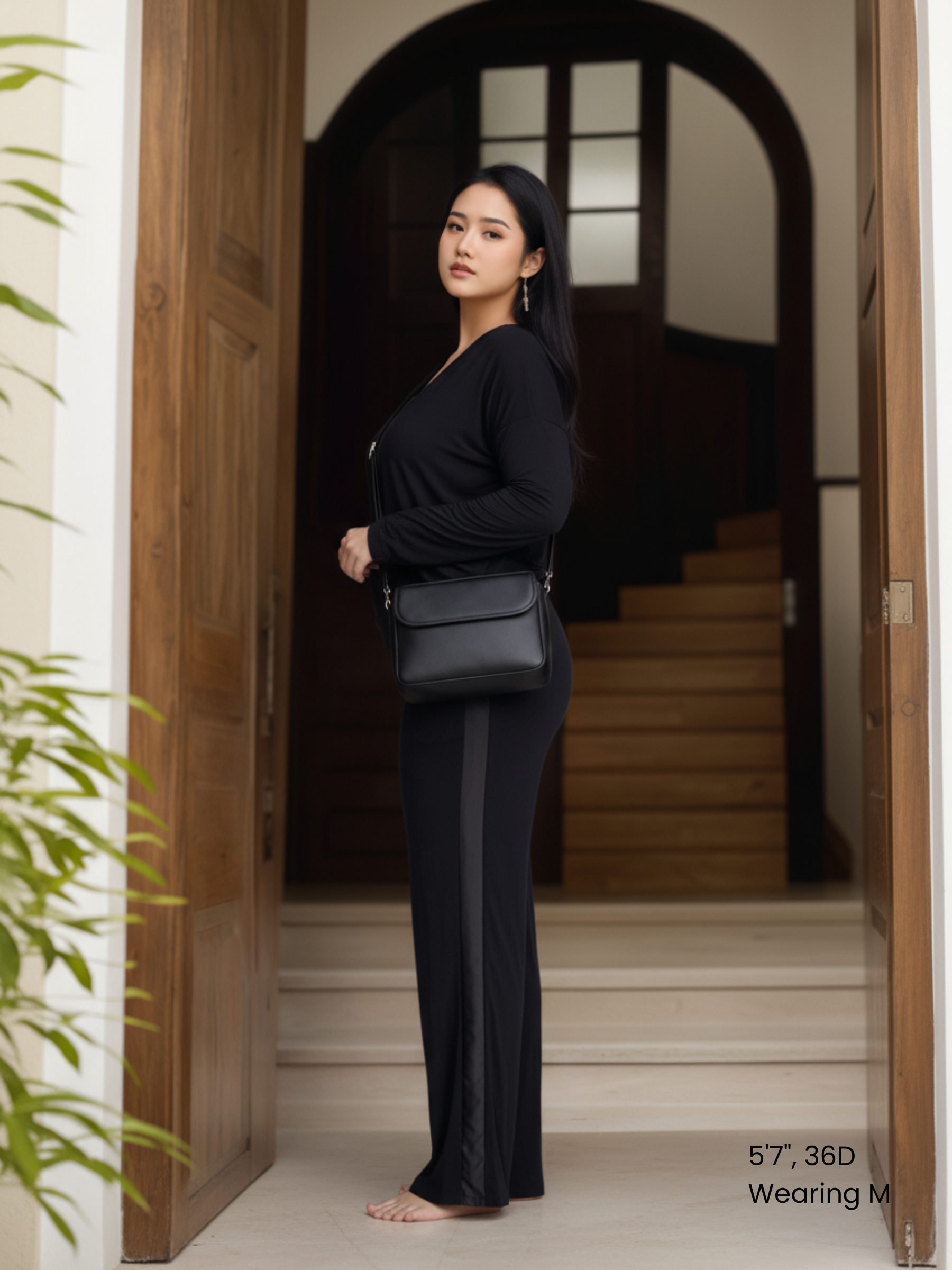 Woman in Midnighties Tuxedo-striped lounge set in color Midnight