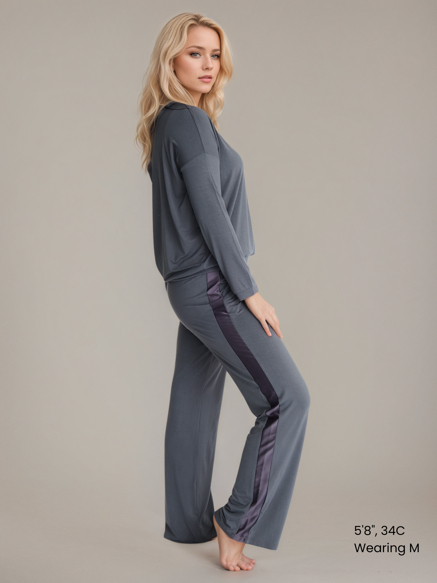 Woman in Midnighties Tuxedo-striped lounge set in color Moonshadow